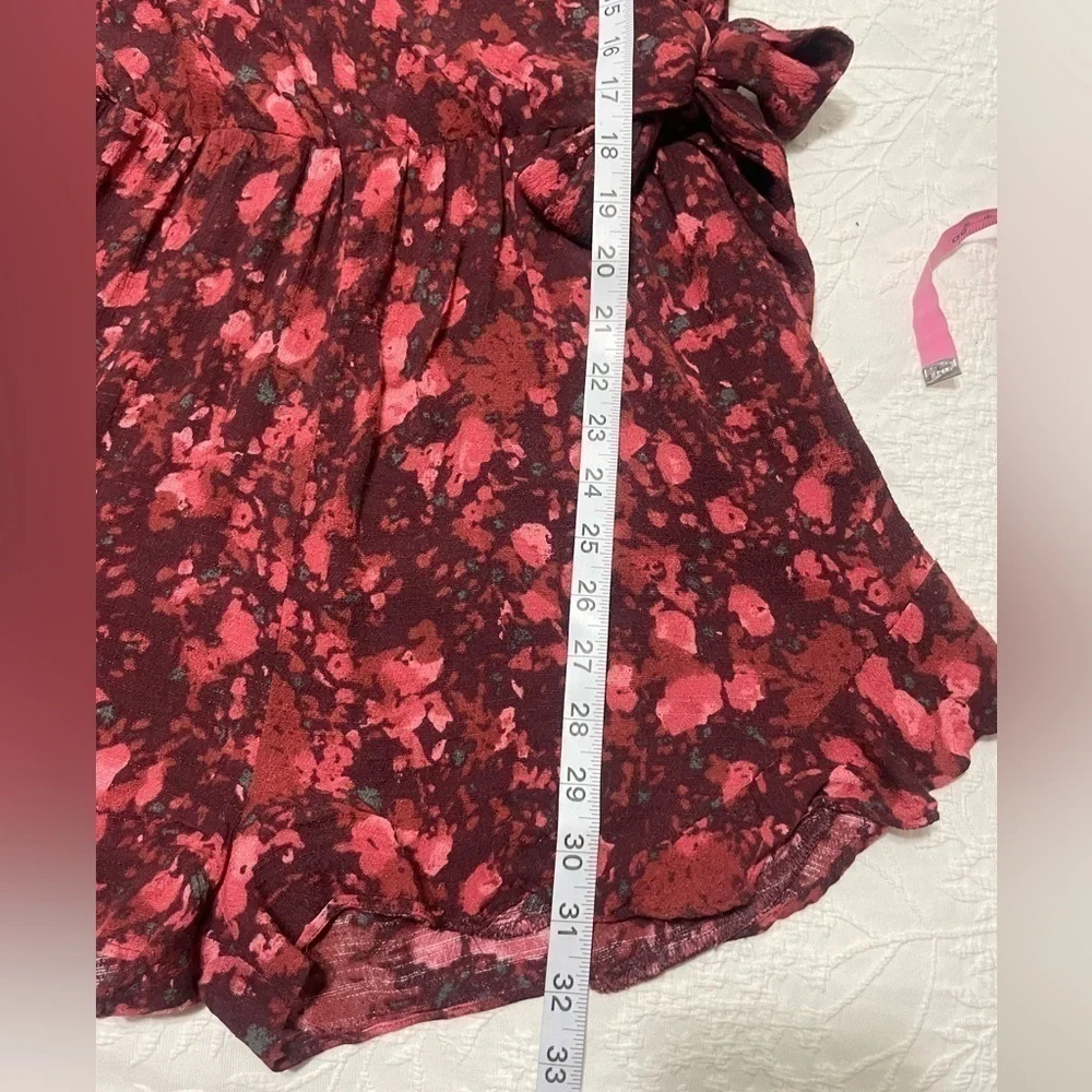 Free People All The Right Ruffles in Wild Moon Floral Romper Size XS OB397455.